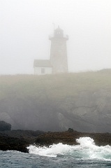 Waves Splash by Rocky Shore of Libby Island Light in Fog